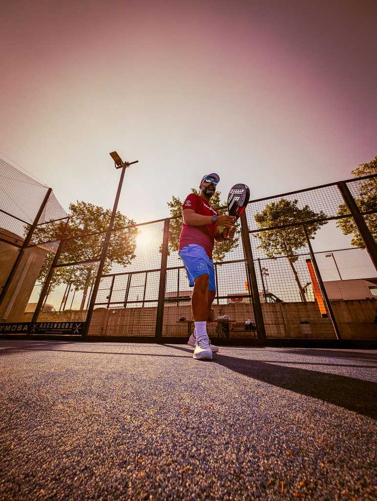 Sunset padel training golden hour Barcelona Spain academy professional